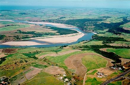 Tugela is the largest River in KwaZulu-Natal. During low flows a sand berm is formed from the south by the predominantly northward movement of the long-shore drift .