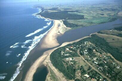 Tugela is the largest River in KwaZulu-Natal. During low flows a sand berm is formed from the south by the predominantly northward movement of the long-shore drift . Of note is the wave pattern in the sea which indicates a significant ebb-tidal delta.